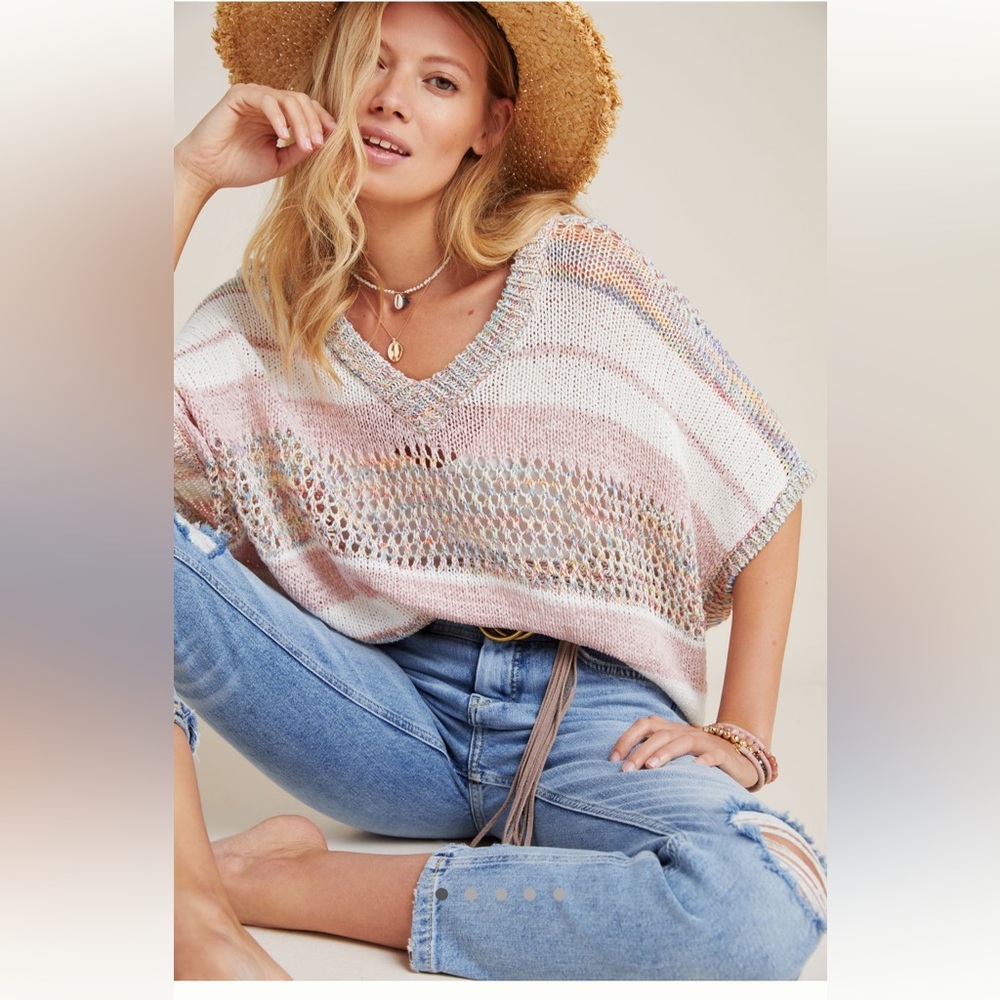 Never worn, colorful poncho with tags from Anthropologie!